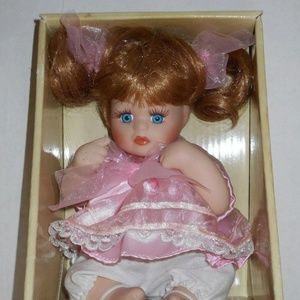 Vintage Bisque Genuine Porcelain Sitting Baby Doll